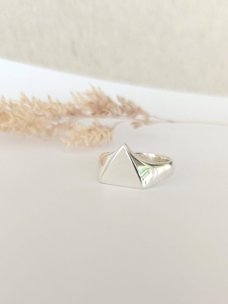 Sello triangular